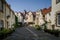 Famous close with traditional stone houses in Edinburgh city streets, Scotland