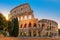 Famous Colosseum at sunrise in Rome, Italy,