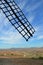 Famous Consuegra Windmill sail and view across the plain, Spain