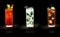 Famous drinks Bloody Mary, Mojito, Cuba Libre  - black background