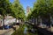 The famous Dutch Oude Delft canal and leaning tower.