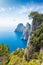 Famous Faraglioni Rocks near Capri Island, Italy. Beautiful paradise image with azure sea in summer sunny day