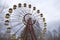 The famous Ferris wheel in an abandoned amusement park in Pripyat. Cloudy weather in the Chernobyl exclusion zone