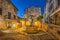 Famous fountain at dusk in Saint Paul de Vence, France