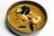 Famous french classic seafood bisque soup in a bowl with shrimp, lobster, crab, cuttlefish, squid, mussels and clams