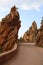 Famous french Road called D81 between badlands called called Calanques de Piana in Corsica