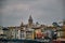 Famous galata tower during overcast and rainy day by taking photo from eminonu district