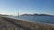 The famous Golden Gate Bridge on the Pacific Ocean on a view from San Francisco Harbor in Crissy Field East Beach