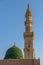 The famous Green Dome and beautiful minaret of Prophet Mosque - Masjid Nabawi in Medina. Islamic buildings