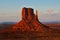 Famous hand shaped rock formation of Monument Valley in Utah with sunset light colors