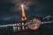 Famous historic Eiffel tower reflecting in a crustal ball during evening time