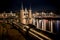 The famous historical `Waterpoort` in the city of Sneek at night with reflections in the canal - Sneek, Friesland, The Netherlan