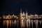 The famous historical `Waterpoort` in the city of Sneek at night with reflections in the canal - Sneek, Friesland, The Netherlan