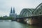 The famous Hohenzollern Bridge with the Cologne Cathedral in the background, in Cologne, Germany