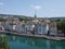 Famous houses on bank of Limmat river and european cityscape landscape of Zurich city in Switzerland