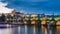 Famous iconic image of Charles bridge, Prague, Czech Republic. Concept of world travel, sightseeing and tourism