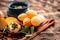 Famous Indian & Asian street food dish i.e. Panipuri snack in a clay bowl along with its flavored spicy water in another clay