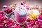 Famous Indian & Asian Summer and Ramadan drink i.e. Gulab shake or Rose falooda in a glass on wooden surface.