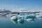 Famous Jökulsárlón Glacier Lagoon in Iceland with several huge ice floes floating on the water