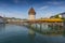 The famous Kapellbrucke Chapel Bridge wooden footbridge across the Reuss River in the city of Lucern, Switzerland