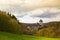 Famous Karlstejn castle in autumn forest,Czech Republic