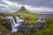 Famous Kirkjufellsfoss waterfall with Kirkjufell mountain, panoramic landscape, Snaefellsnes peninsula, Iceland