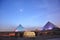 Famous land with Egyptian gods, pyramids at night and amazing light plays