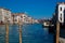 Famous landmark panoramic view Venice Italy with Bridge Rialto and blue sky and gondola boat water