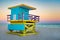 Famous lifeguard tower at South Beach in Miami with a beautiful sunset sky