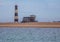 Famous lighthouse at the Atlantic Ocean near Walvis Bay in Namibia