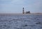 Famous lighthouse at the Atlantic Ocean near Walvis Bay in Namibia