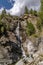 The famous Lillaz waterfalls, near Cogne, Valle d`Aosta, Italy, in the summer season