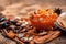 Famous mango preservation i.e. Murba or Murabba in a glass bowl on jute bag`s surface along with dry fruits and spices