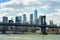 Famous Manhattan bridge on the background of skyscrapers and Brooklyn bridge. Postcard view of New York, USA. United States of