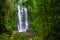 A famous Munduk Waterfall in a tropical jungle island of Bali, Indonesia