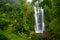 A famous Munduk Waterfall in a tropical jungle island of Bali, Indonesia