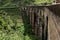 The famous nine-arch bridge of the railway in the jungle in Sri Lanka