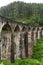 The famous nine-arch bridge of the railway in the jungle in Sri Lanka