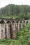 The famous nine-arch bridge of the railway in the jungle in Sri Lanka