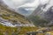 Famous norwegian mountains road Trollstigen top view of valley. Epic nordic nature with rocks