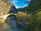 The famous old stoned bridge of Konitsa over Aoos river. Tymfi mount, Zagori, Epirus, Greece, Europe