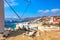 Famous old windmill in Chora with city view. Summer sunny day. Mykonos island, Greece