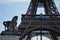 The famous Paris sight, the tour Eiffel, a horse sculpture and street lamps