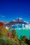 Famous Perito Moreno glacier and mountain turquoise lagoon with austral forests at golden Autumn in Patagonia, South America,