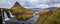 Famous picturesque Kirkjufell mountain and Kirkjufellsfoss waterfall next to GrundarfjÃ¶rÃ°ur at West Iceland autumn view