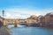 Famous Ponte Vecchio Bridge, medieval stone bridge over the Arno River in Florence, Tuscany, Italy. Major landmark of the Italian