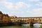 The famous Ponte Vecchio bridge over the Arno river in Florence, Italy. This is a top tourist attraction in the city