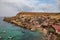 Famous Popeye village in Malta. Azure bay in the rocks.
