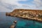 Famous Popeye village in Malta. Azure bay in the rocks.