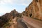 Famous red badlands  called Calanques de Piana of western Corsica and the road called D81